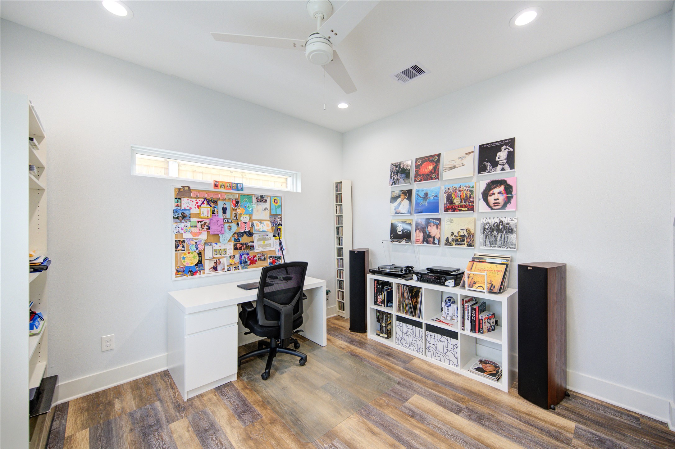 1215 Bethlehem Street Houston, TX 77018 - Photo 13 of 42 a view of a workspace with furniture and furniture in a room