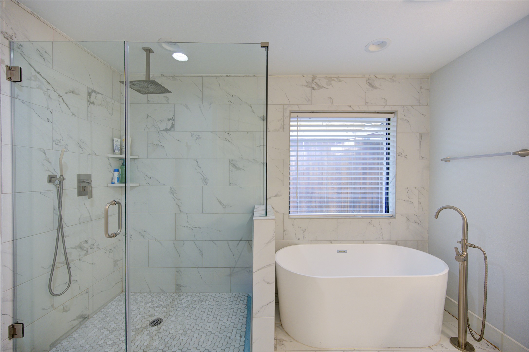 1215 Bethlehem Street Houston, TX 77018 - Photo 18 of 42 a white bath tub sitting next to a shower
