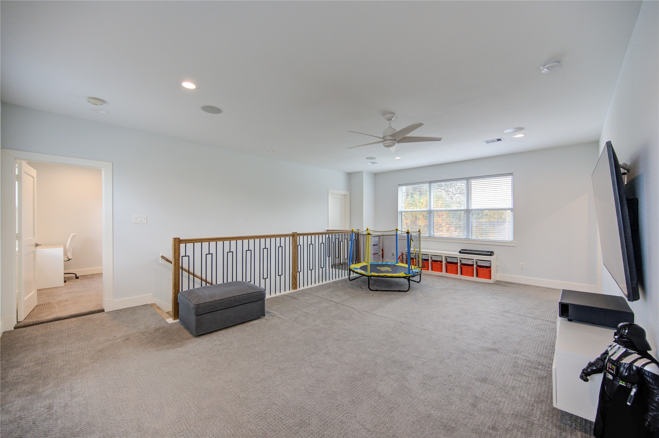 1215 Bethlehem Street Houston, TX 77018 - Photo 19 of 42 a view of a livingroom with furniture and a flat screen tv