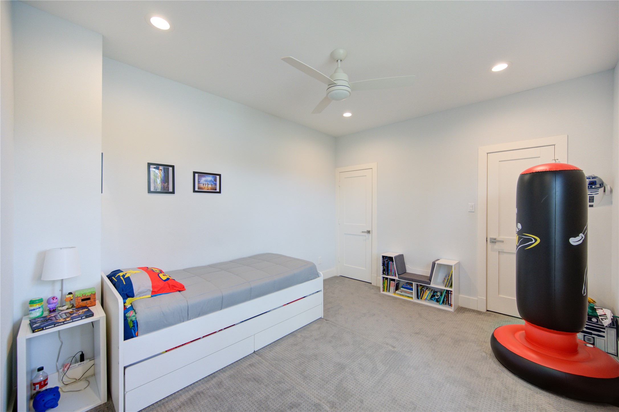 1215 Bethlehem Street Houston, TX 77018 - Photo 22 of 42 a bedroom with a bed and gym equipment