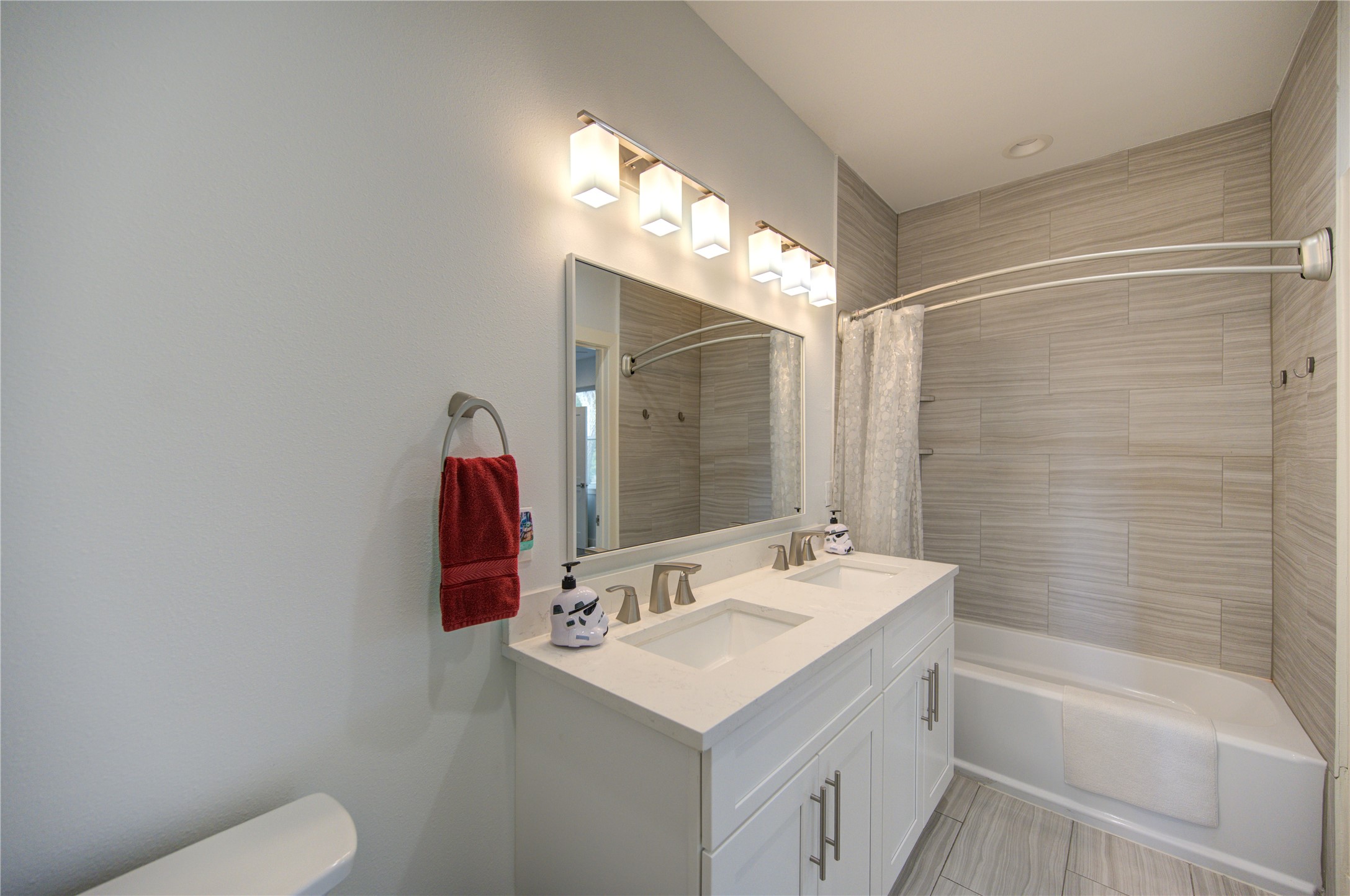 1215 Bethlehem Street Houston, TX 77018 - Photo 24 of 42 a bathroom with a sink toilet vanity and shower