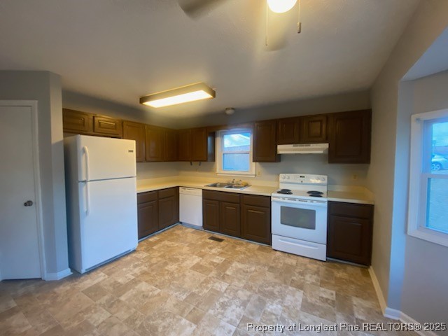 110 Bruce Lane Spring Lake, NC 28390 - Photo 5 of 11 a kitchen with stainless steel appliances granite countertop a refrigerator and a stove top oven