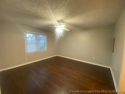 110 Bruce Lane Spring Lake, NC 28390 - Photo 6 of 11 an empty room with wooden floor and windows