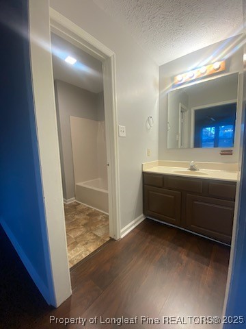 110 Bruce Lane Spring Lake, NC 28390 - Photo 7 of 11 a bathroom with a sink and a mirror