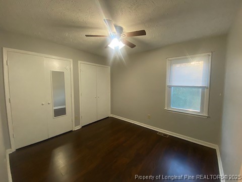 110 Bruce Lane Spring Lake, NC 28390 - Photo 10 of 11 a view of an empty room with window and wooden floor