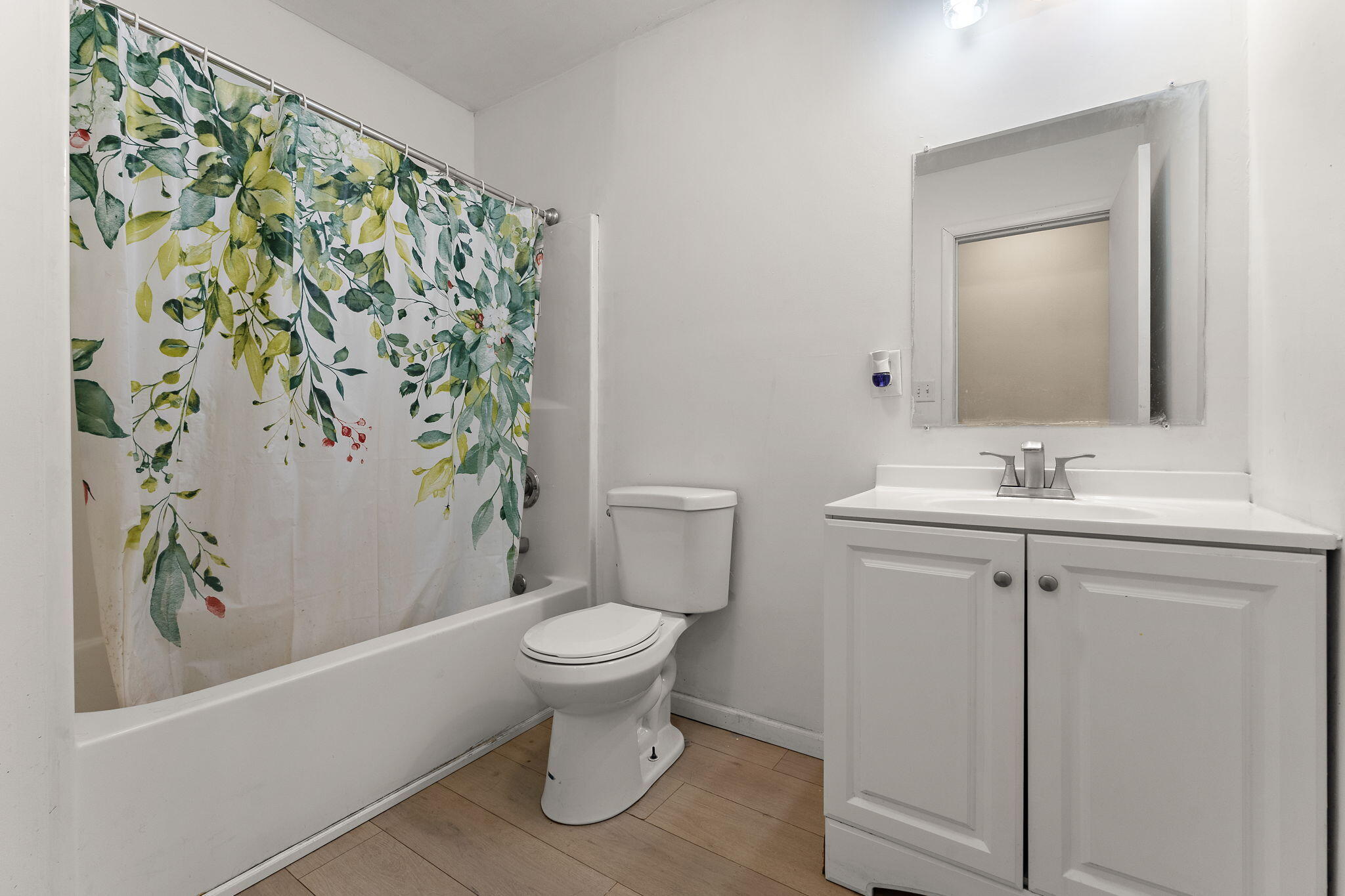 2334 Venus Street Portage, IN 46368 - Photo 13 of 22 a bathroom with a sink and a mirror