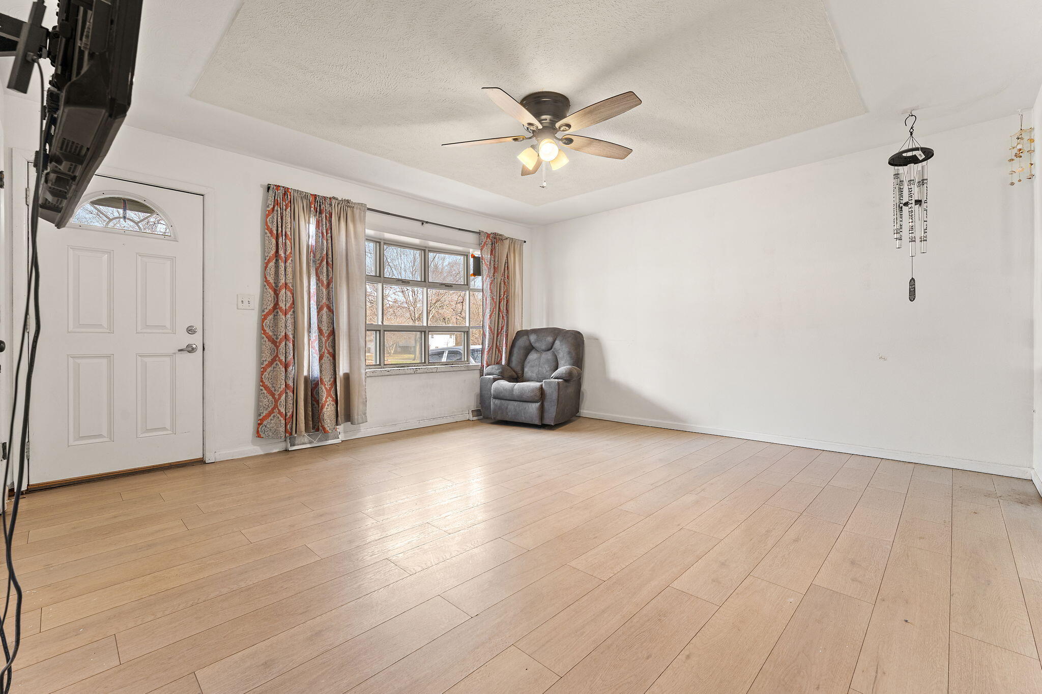 2334 Venus Street Portage, IN 46368 - Photo 3 of 22 a view of an empty room with a window