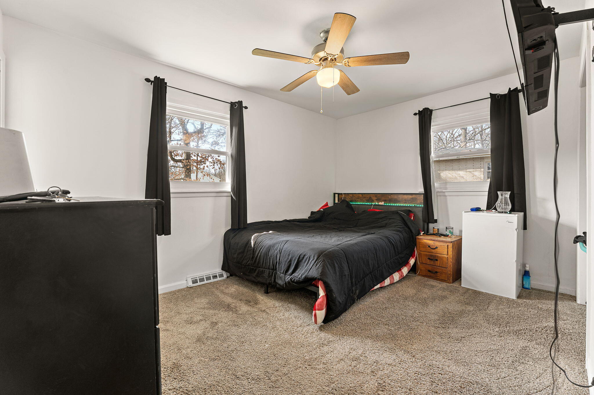 2334 Venus Street Portage, IN 46368 - Photo 8 of 22 a bedroom with a bed and window