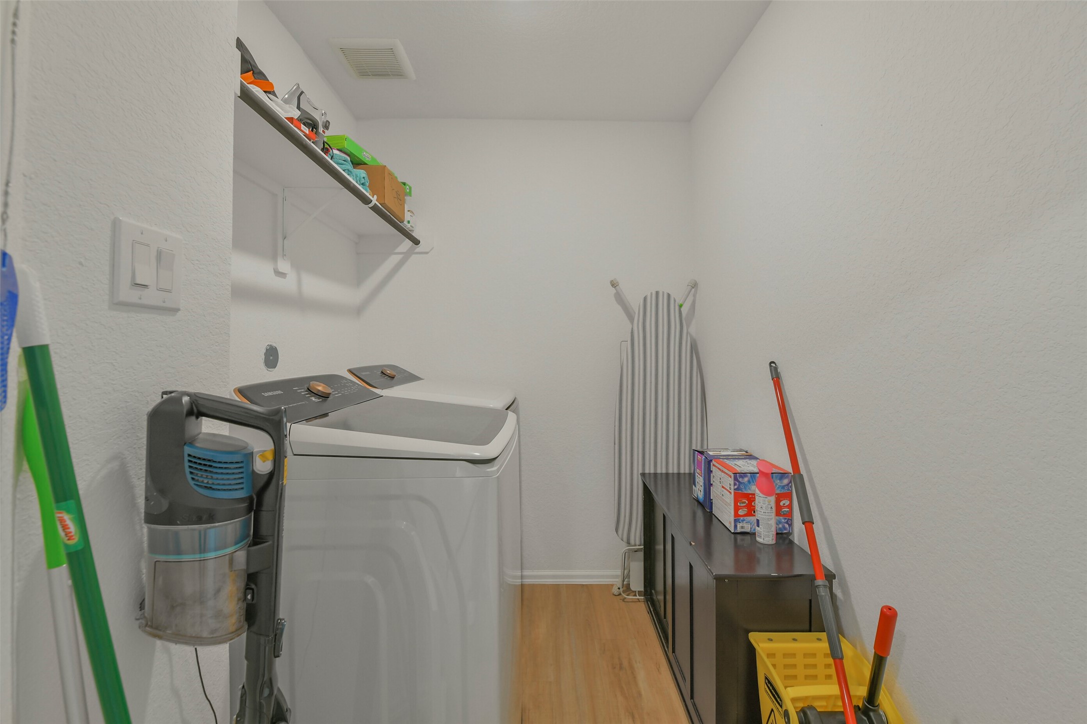 13978 Manatee Street Splendora, TX 77372 - Photo 29 of 39 Dedicated utility room with space for full-size washer and dryer.