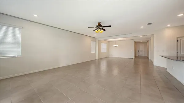 a view of a livingroom with a ceiling fan