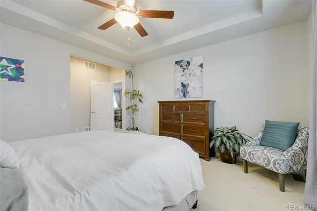 a bedroom with a bed and a cabinets