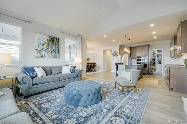 a living room with furniture or couch and a coffee table