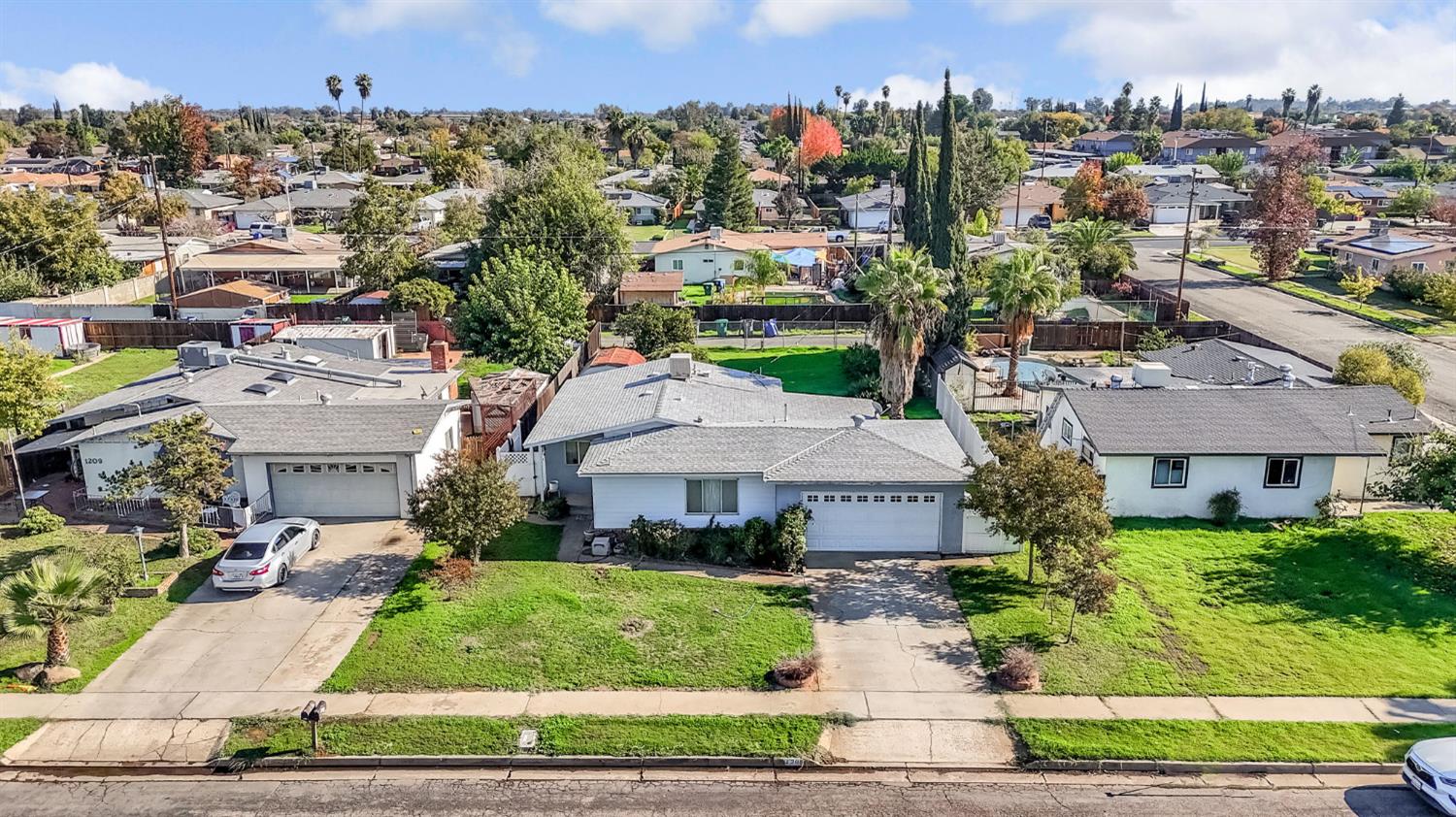1205 Rogers Street Madera, CA 93638 - Photo 2 of 23 an aerial view of multiple house