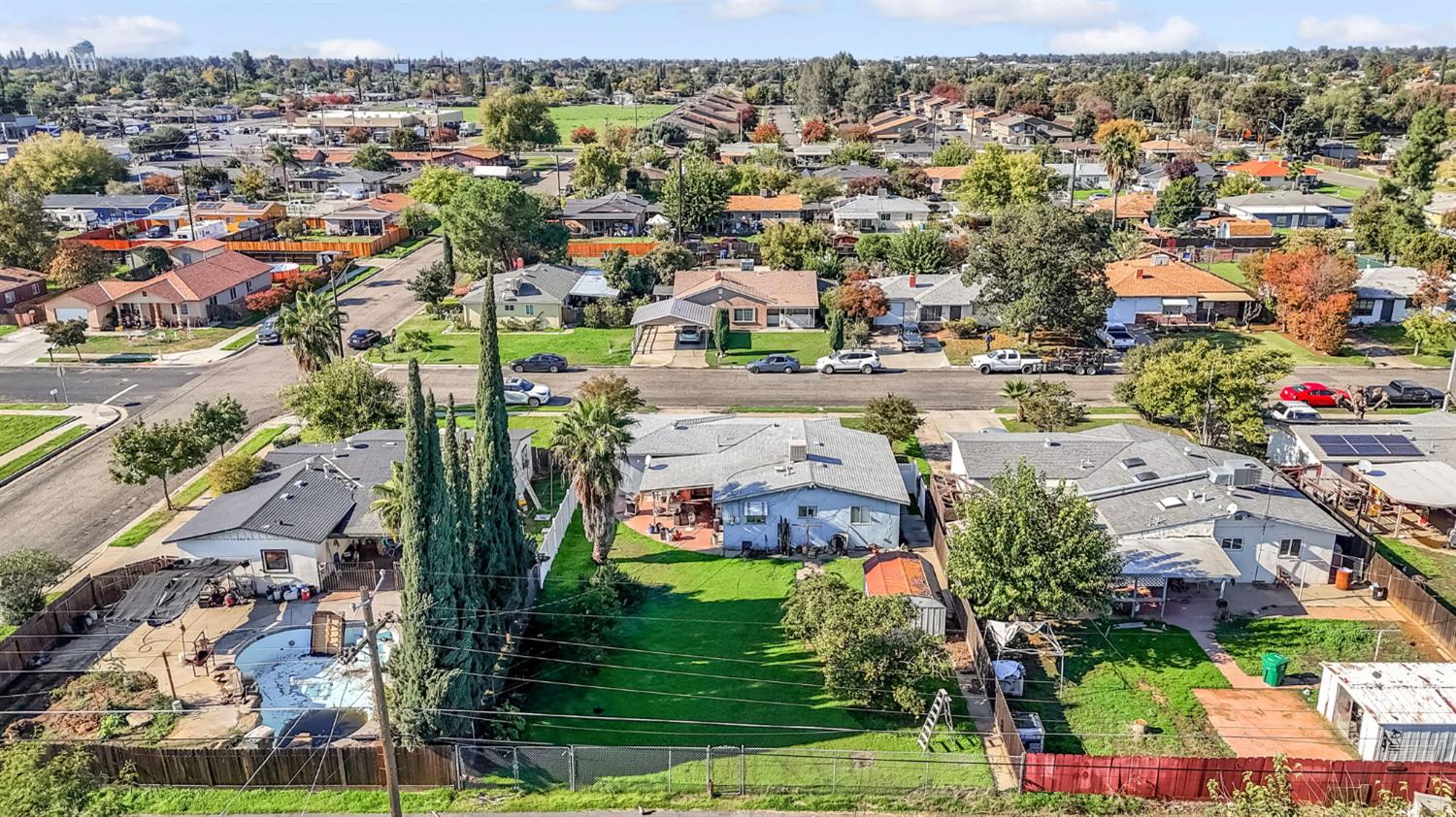 1205 Rogers Street Madera, CA 93638 - Photo 7 of 23 an aerial view of residential houses with outdoor space