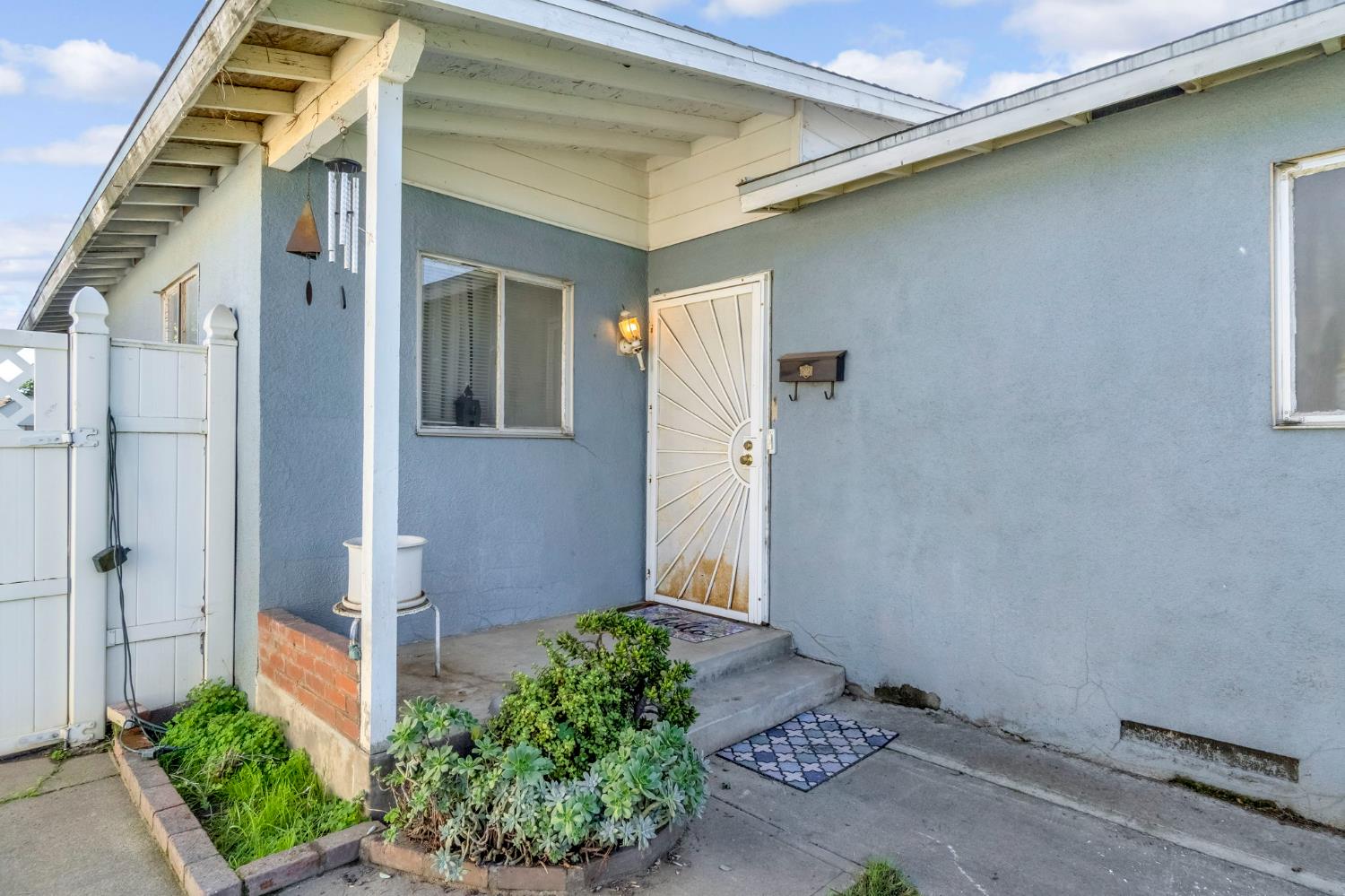 1205 Rogers Street Madera, CA 93638 - Photo 10 of 23 a view of a house with a backyard
