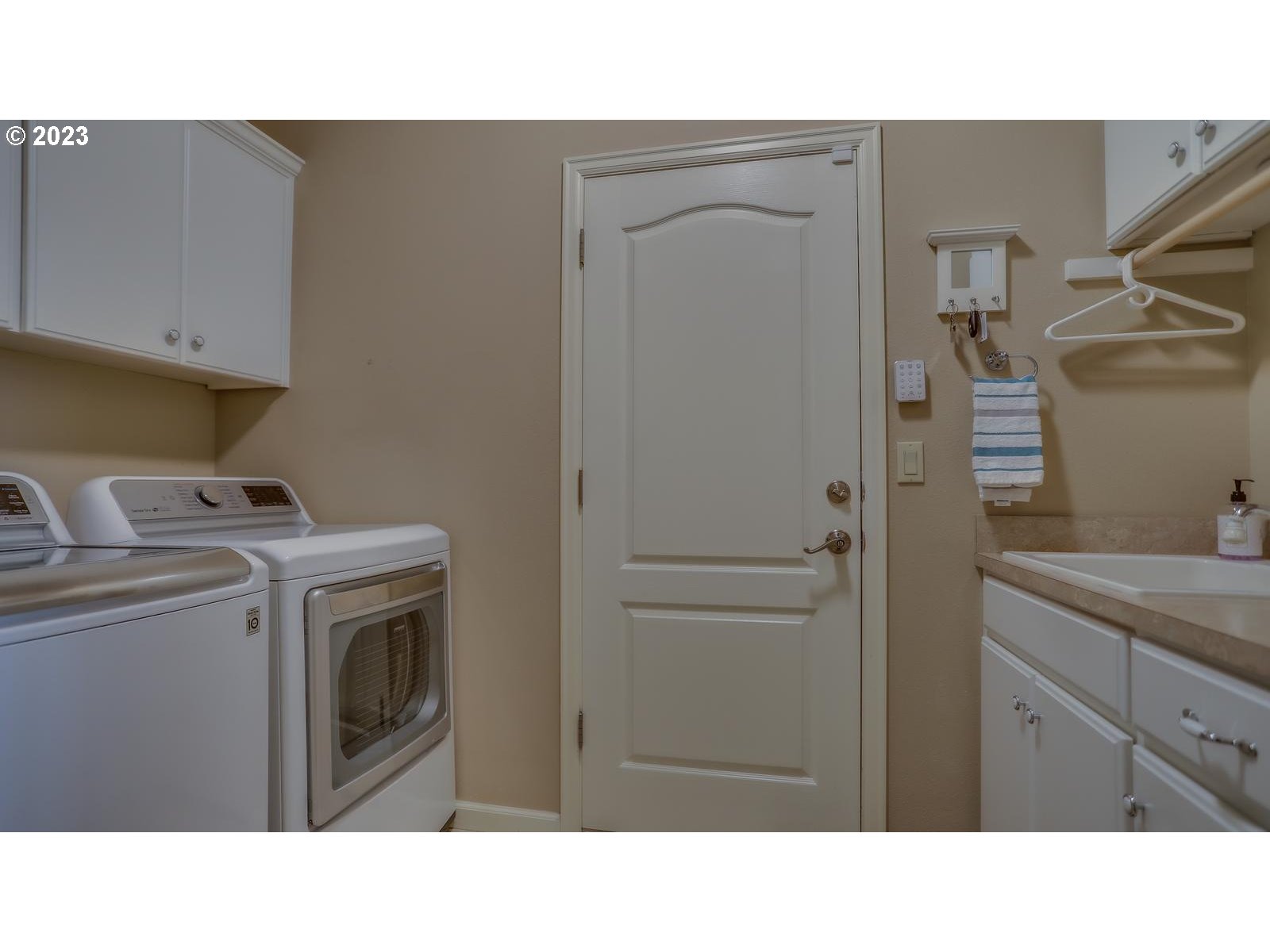 3919 Southeast 31st Street Gresham, OR 97080 - Photo 16 of 26 a kitchen with a sink and cabinets
