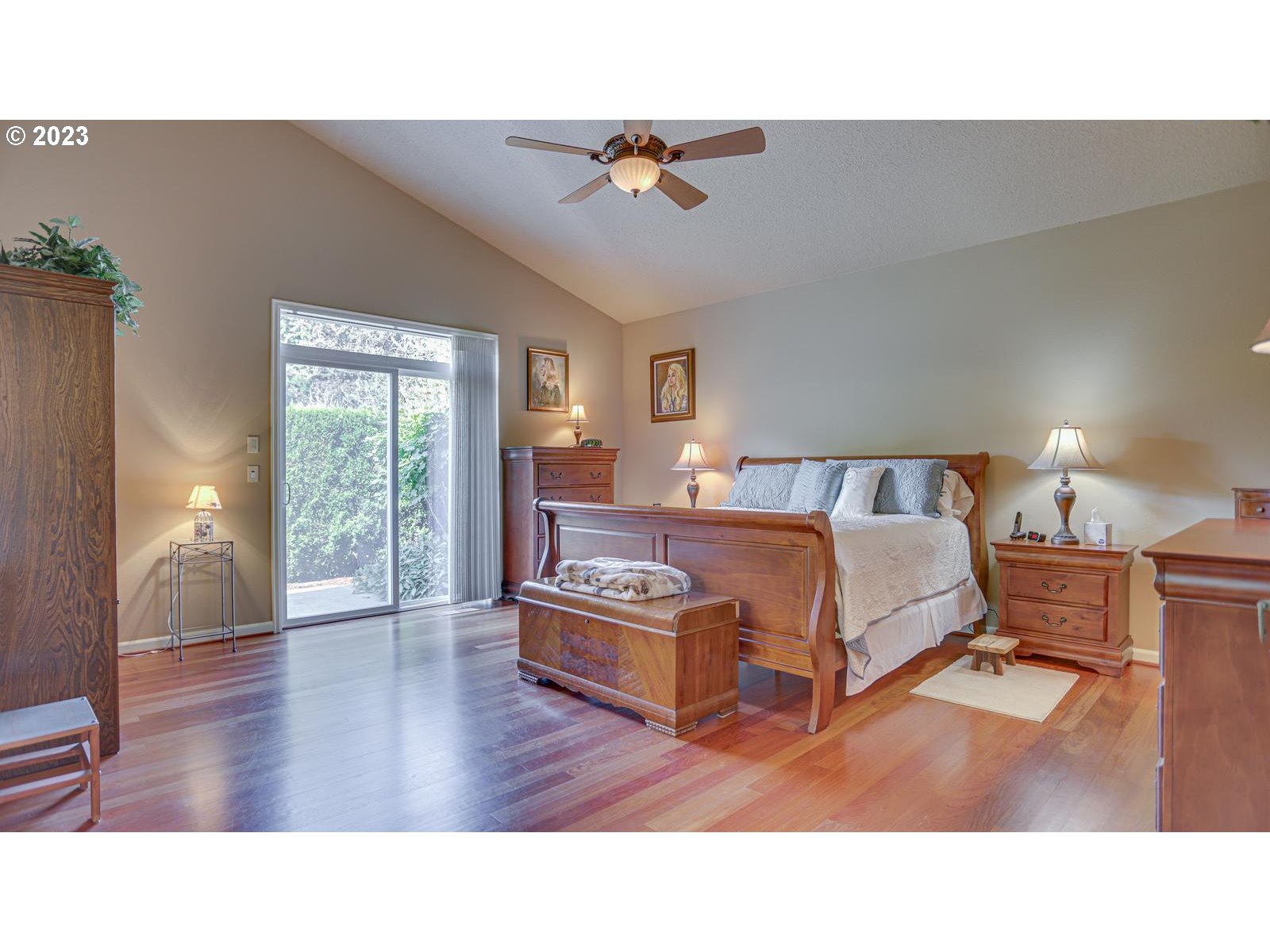 3919 Southeast 31st Street Gresham, OR 97080 - Photo 17 of 26 a living room with a bed furniture and a wooden floor