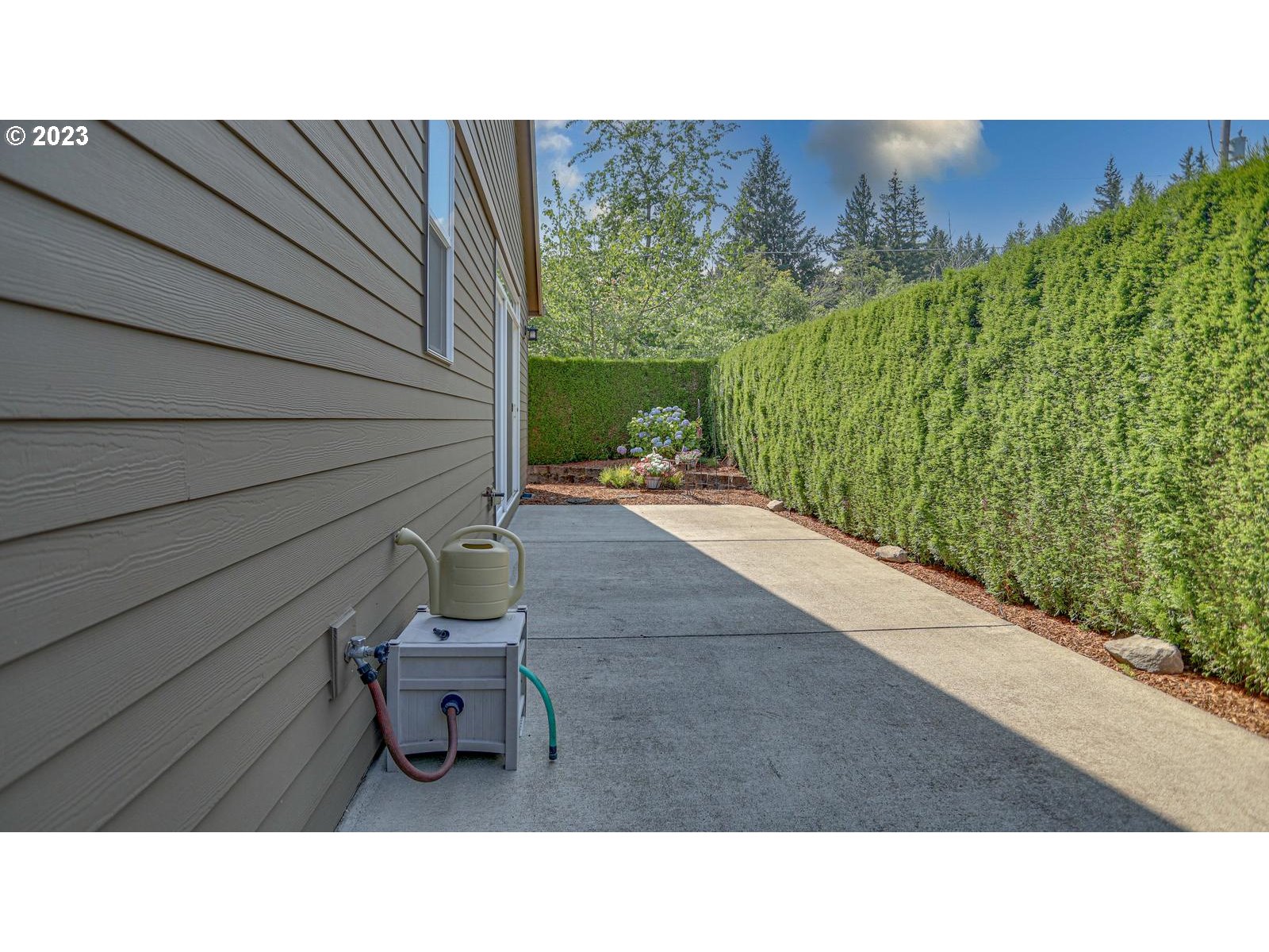 3919 Southeast 31st Street Gresham, OR 97080 - Photo 25 of 26 a open area view with a bench