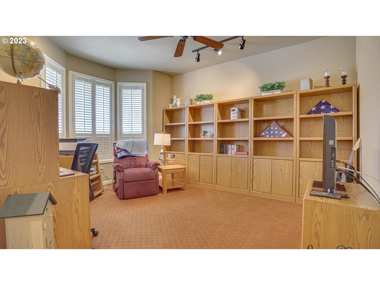 3919 Southeast 31st Street Gresham, OR 97080 - Photo 6 of 26 a living room with furniture and a flat screen tv