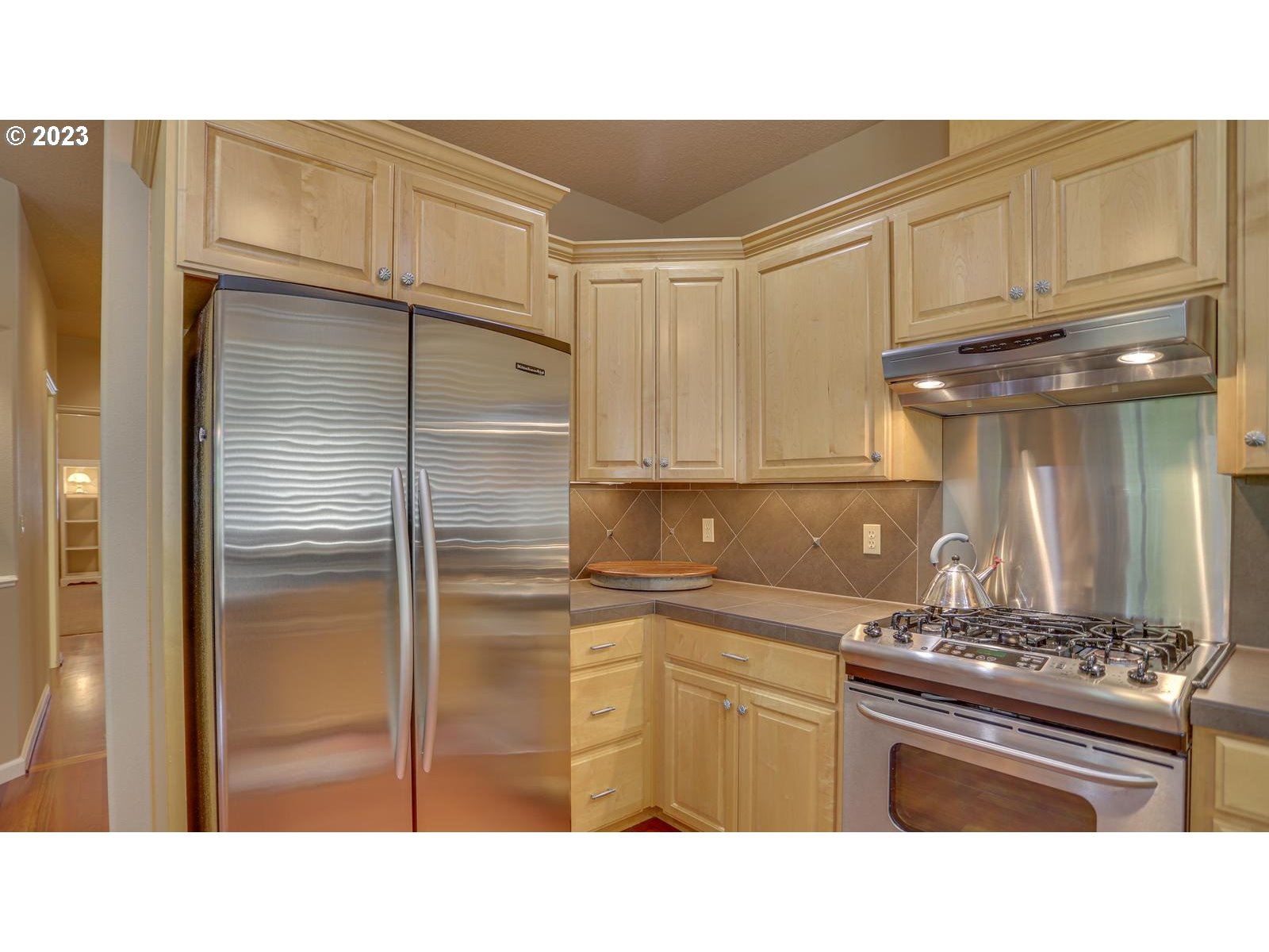 3919 Southeast 31st Street Gresham, OR 97080 - Photo 9 of 26 a kitchen with a refrigerator and a sink