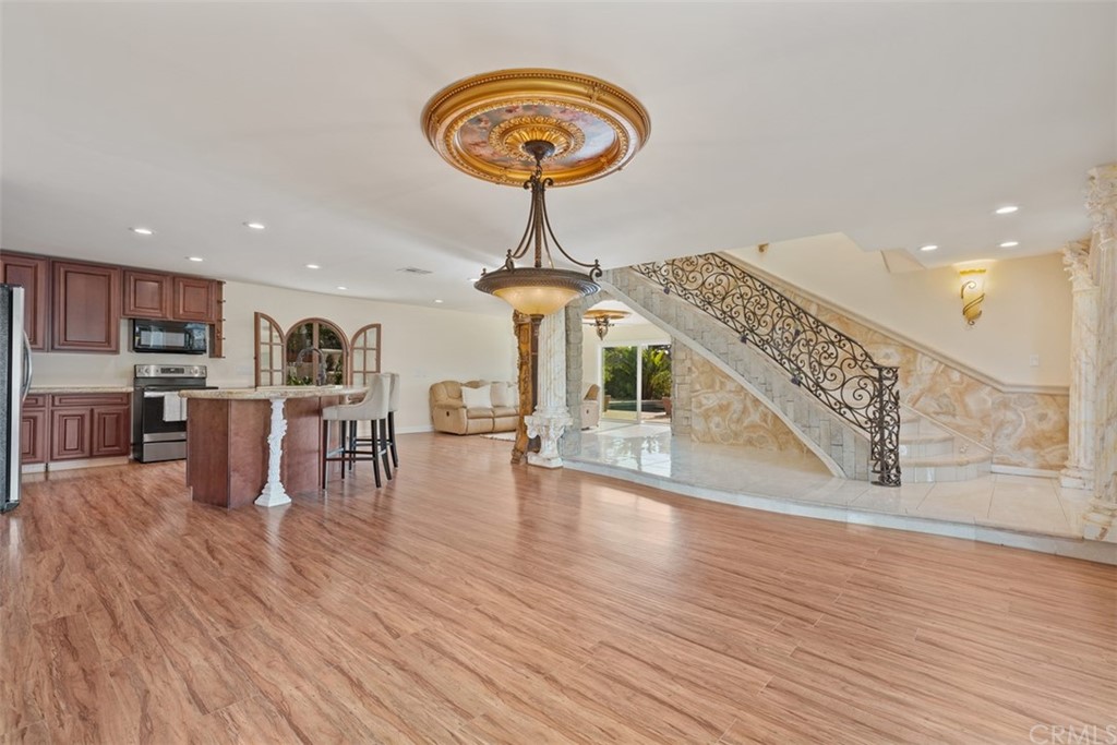 29752 Ivy Glenn Drive Laguna Niguel, CA 92677 - Photo 11 of 36 a view of a room with lots of furniture and wooden floor
