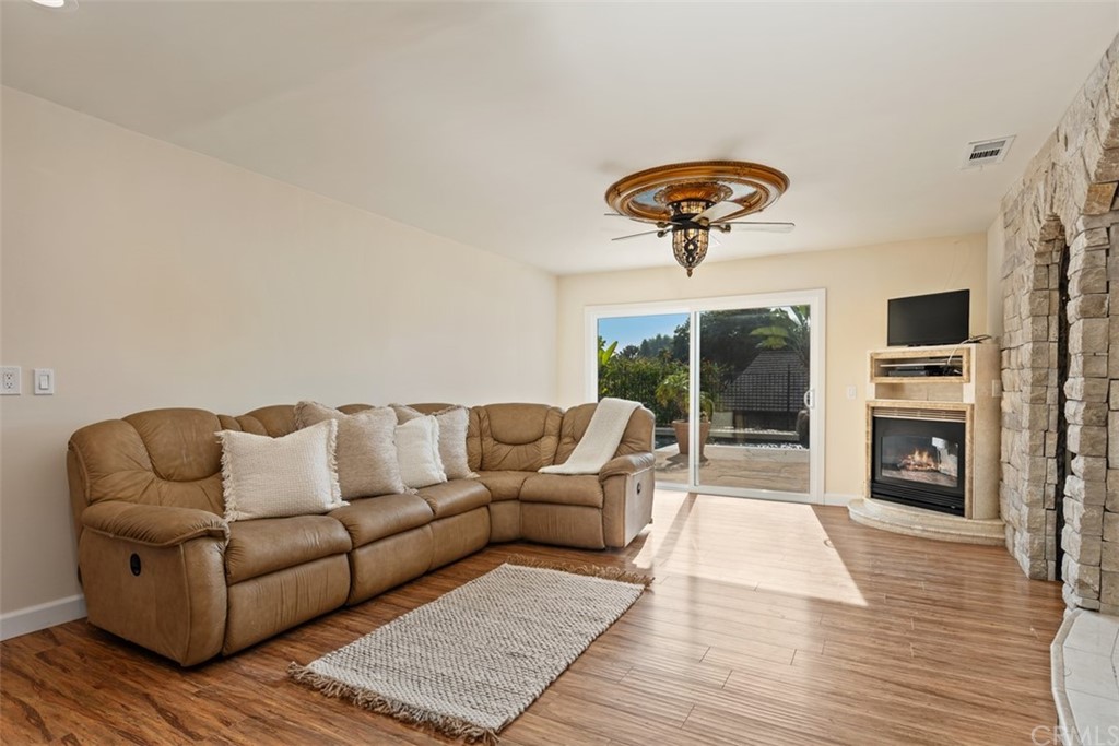 29752 Ivy Glenn Drive Laguna Niguel, CA 92677 - Photo 16 of 36 a living room with furniture and a large window