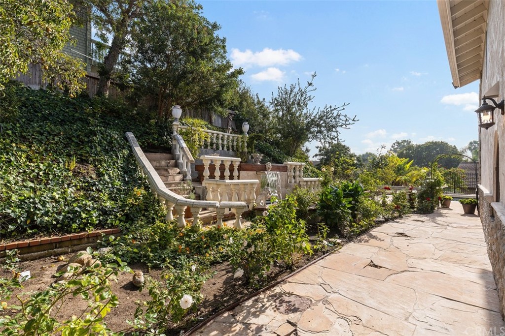 29752 Ivy Glenn Drive Laguna Niguel, CA 92677 - Photo 26 of 36 a view of a chair and table in the garden