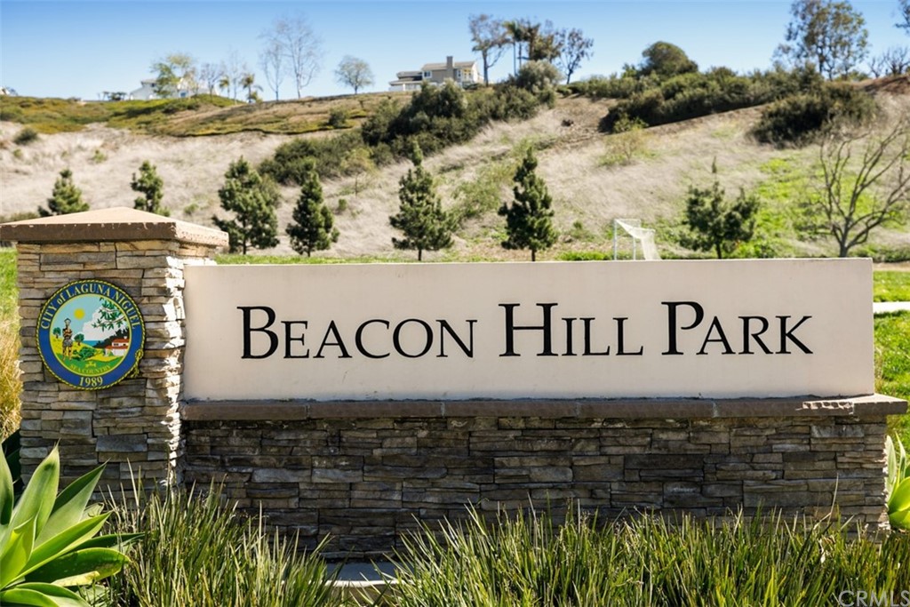 29752 Ivy Glenn Drive Laguna Niguel, CA 92677 - Photo 34 of 36 a sign that is on a brick wall