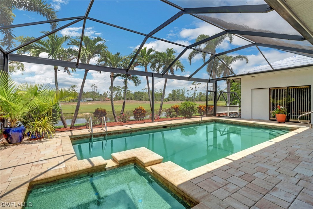 14813 Soaring Eagle Court Fort Myers, FL 33912 - Photo 17 of 19 a view of a swimming pool with a patio