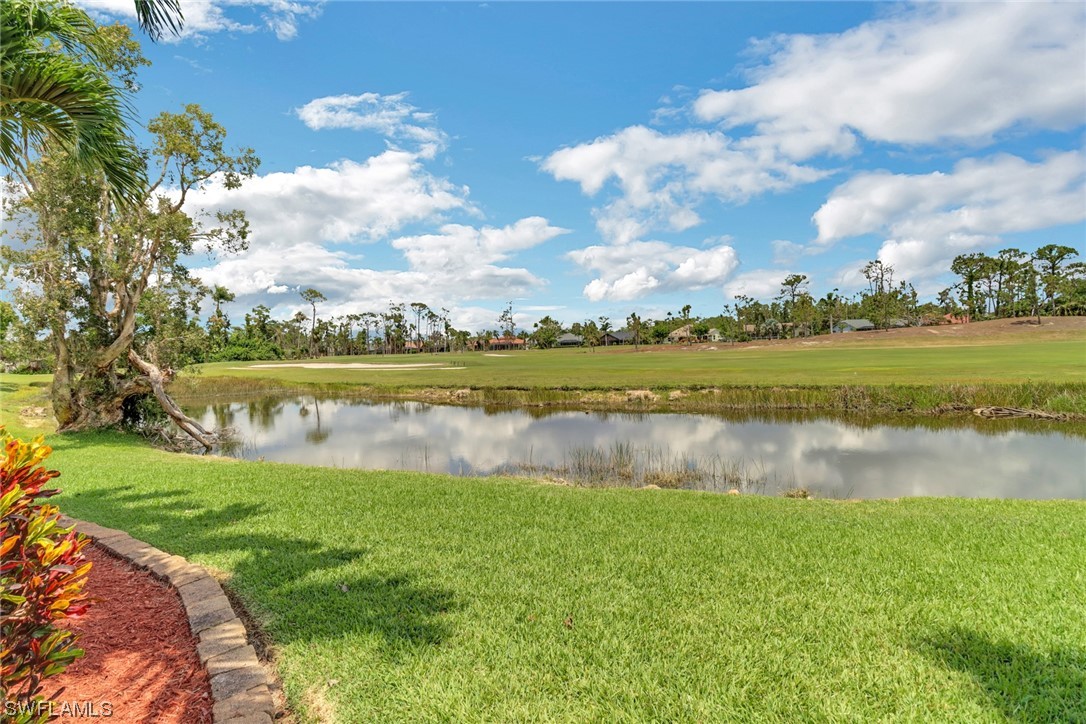 14813 Soaring Eagle Court Fort Myers, FL 33912 - Photo 18 of 19 a view of a lake with a big yard