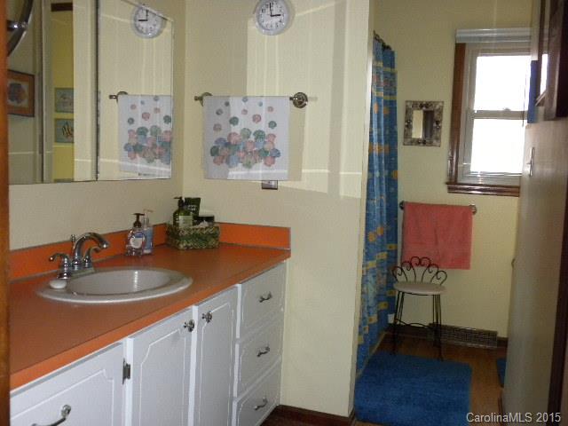 1813 Claude Austin Road Monroe, NC 28112 - Photo 12 of 22 a bathroom with a sink and a mirror