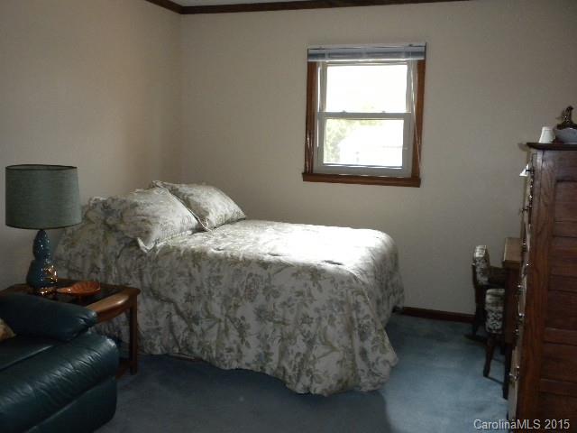 1813 Claude Austin Road Monroe, NC 28112 - Photo 14 of 22 a bedroom with a bed and a window