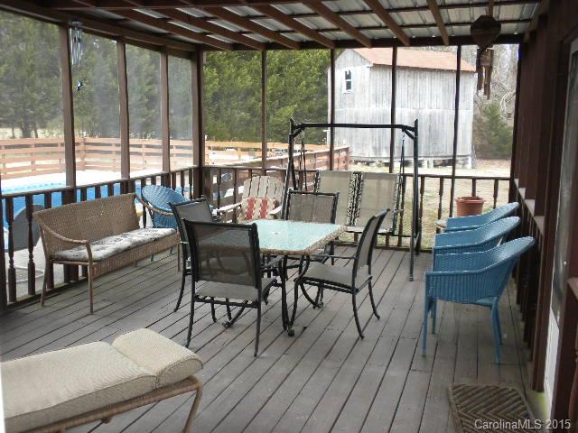 1813 Claude Austin Road Monroe, NC 28112 - Photo 16 of 22 a dining room with furniture window and wooden floor
