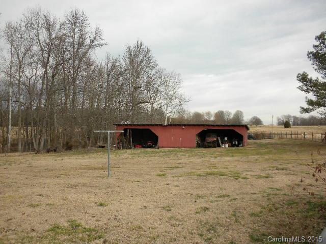 1813 Claude Austin Road Monroe, NC 28112 - Photo 19 of 22 a view of outdoor space with deck and kitchen