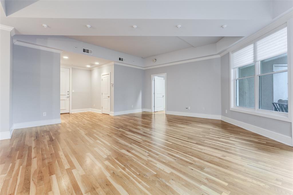 5055 Addison Circle, Unit 205 Addison, TX 75001 - Photo 5 of 24 Beautiful hardwood floors throughout