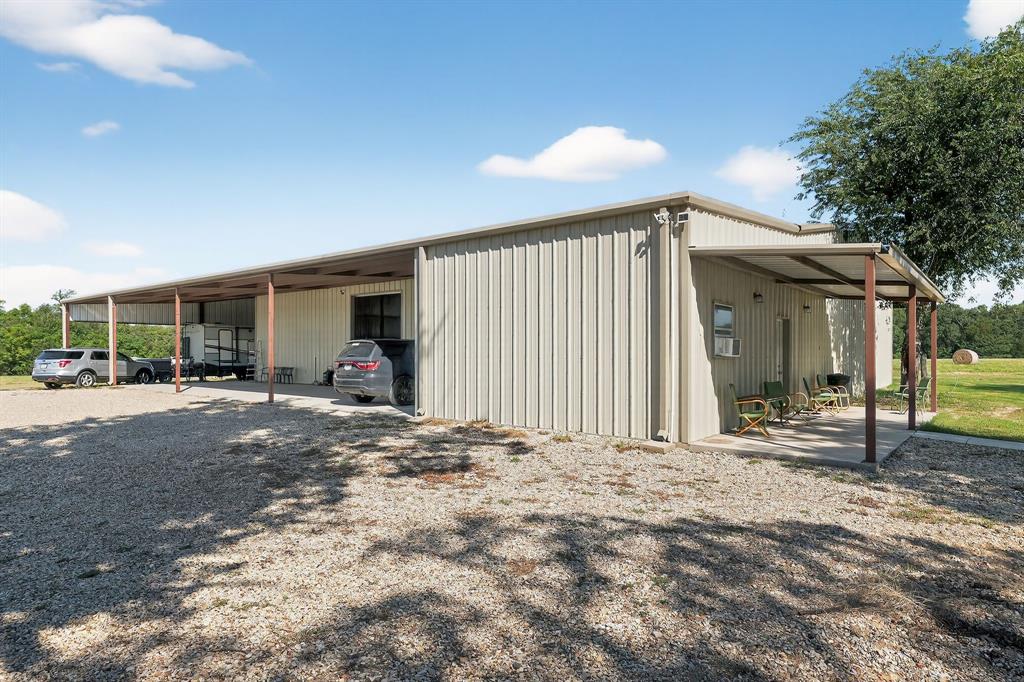 5485 Highway 7 Marlin, TX 76661 - Photo 21 of 36 View of outdoor structure featuring a carport