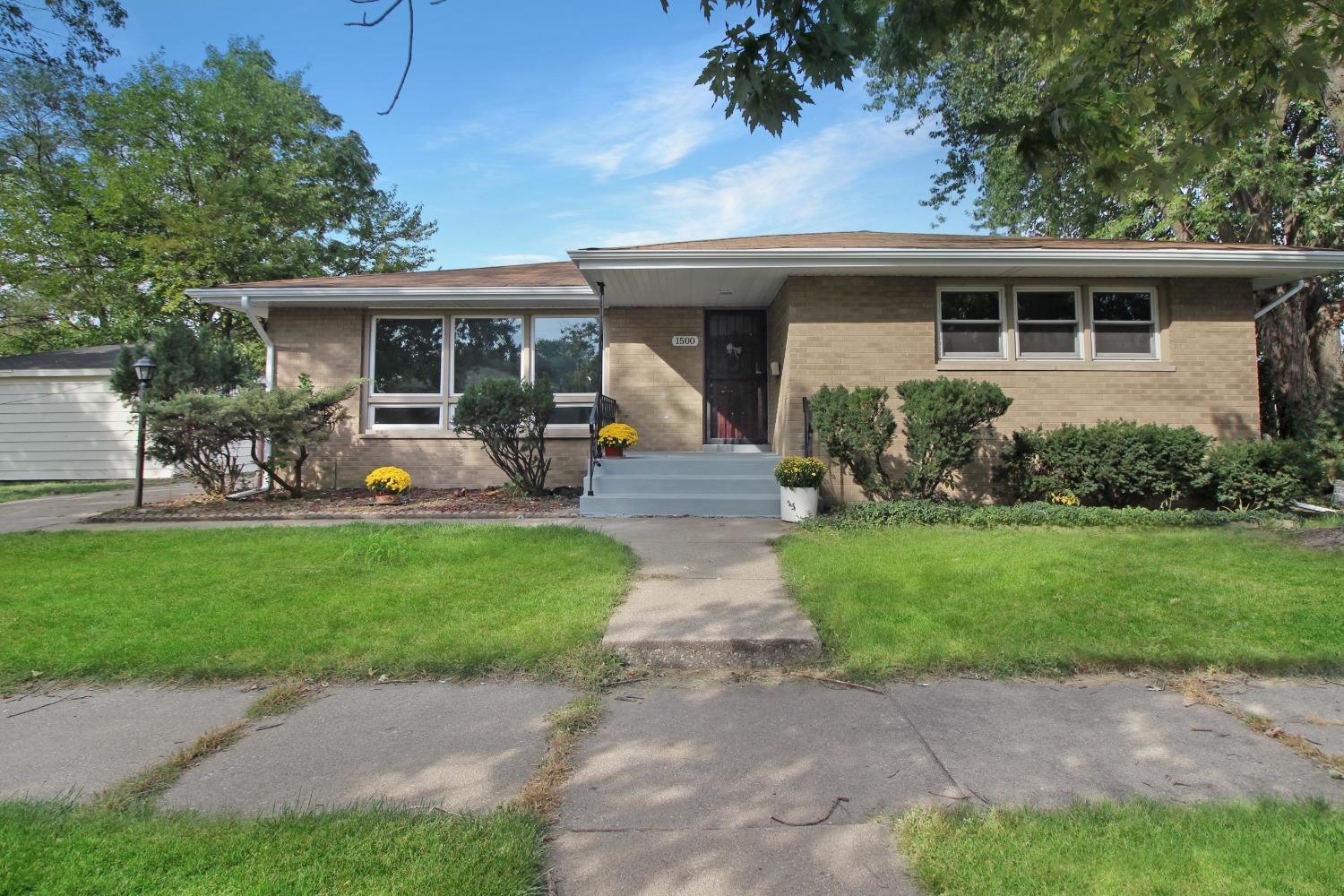 1500 Hendricks Street Gary, IN 46404 - Photo 1 of 1 a front view of house with a garden and patio