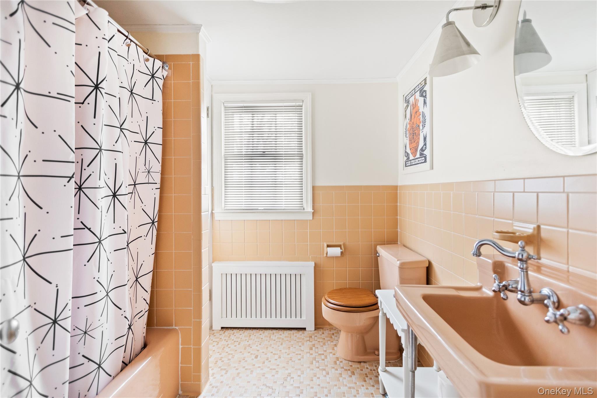 11 Bieselin Road Bellport, NY 11713 - Photo 14 of 17 a bathroom with a sink and a mirror