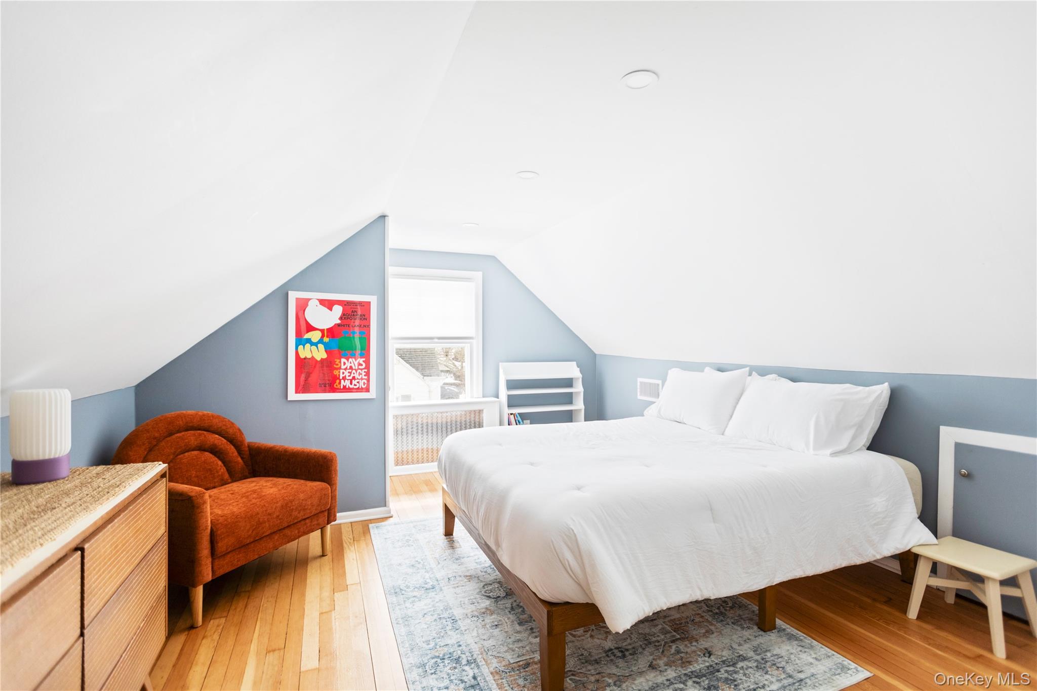 11 Bieselin Road Bellport, NY 11713 - Photo 15 of 17 a bedroom with a bed and a couch