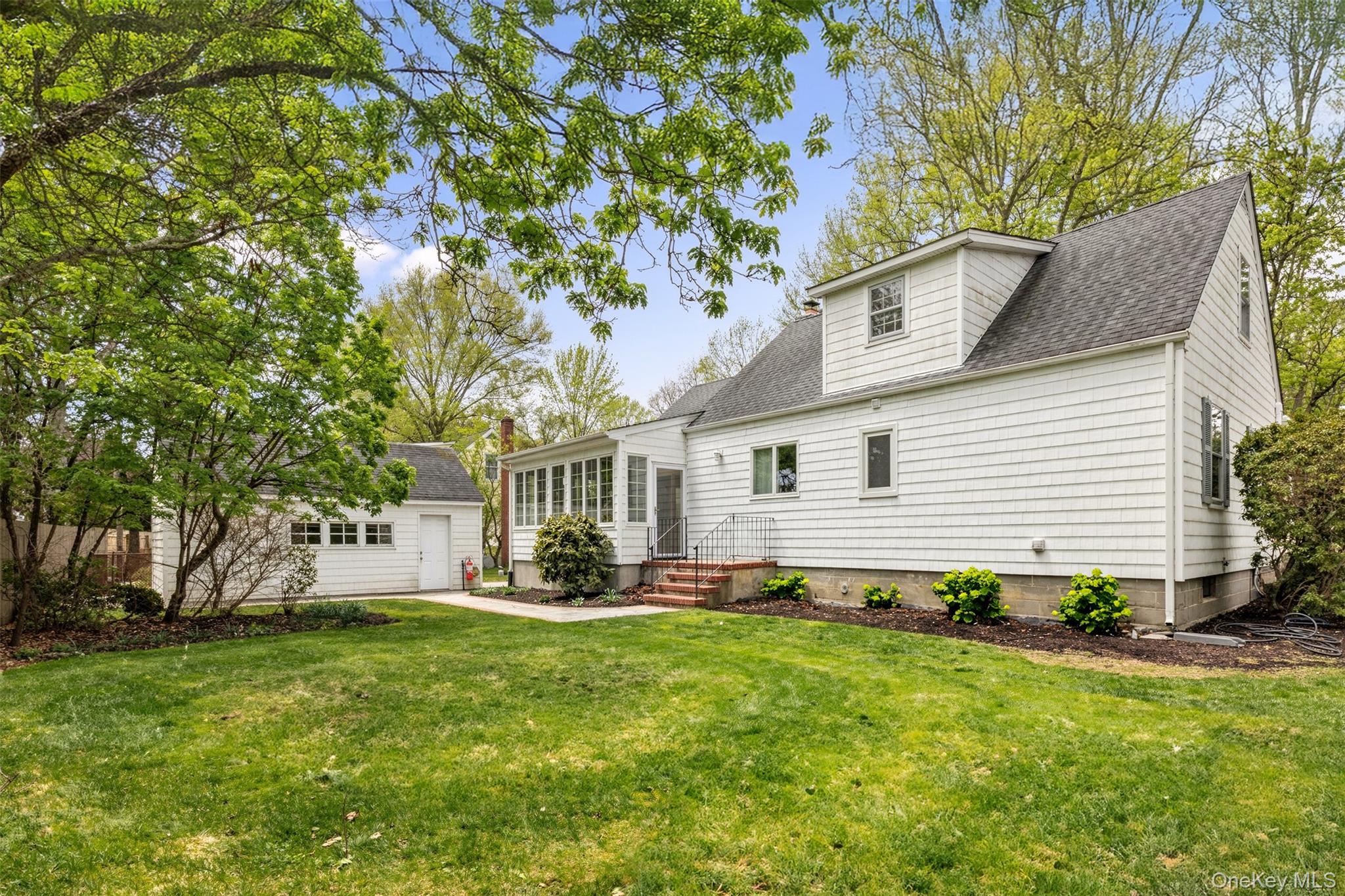 11 Bieselin Road Bellport, NY 11713 - Photo 17 of 17 a front view of house with yard