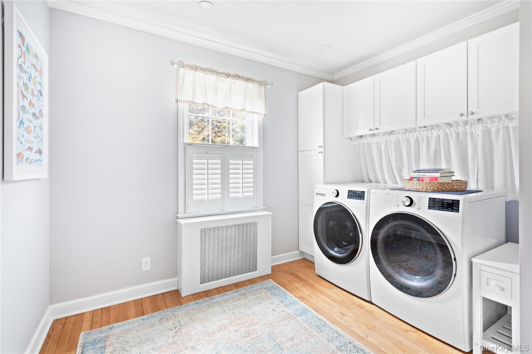 11 Bieselin Road Bellport, NY 11713 - Photo 10 of 17 a utility room with dryer and washer