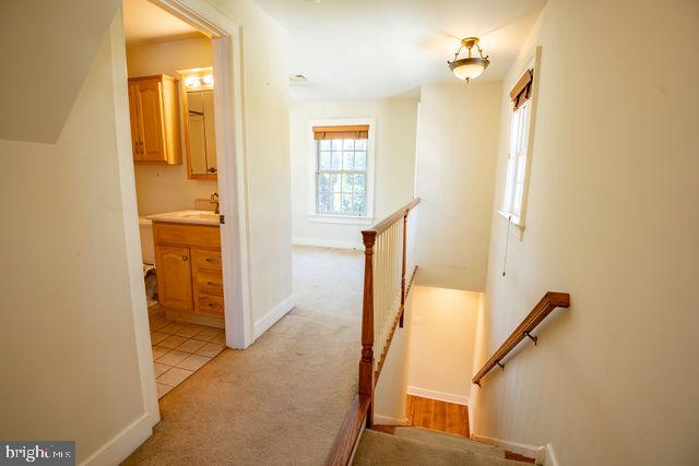 6 Letchworth Avenue Yardley, PA 19067 - Photo 12 of 23 a view of a bathroom from a hallway