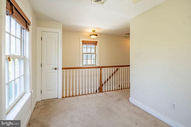 6 Letchworth Avenue Yardley, PA 19067 - Photo 13 of 23 a view of a big room with windows and chandelier fan