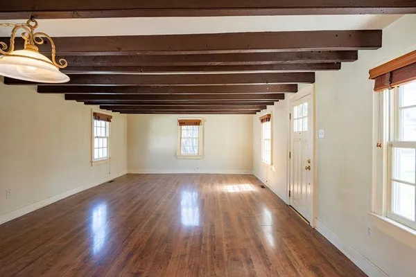 a view of entryway with wooden floor