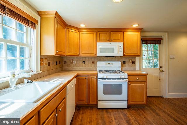 6 Letchworth Avenue Yardley, PA 19067 - Photo 9 of 23 a kitchen with a stove a sink and a microwave