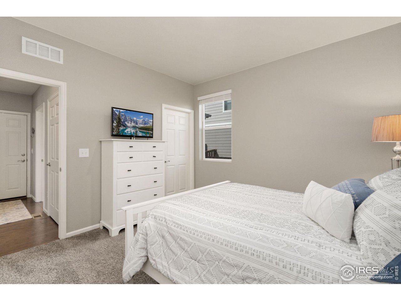176 Haymaker Lane Severance, CO 80550 - Photo 13 of 25 a bedroom with a bed and with furniture