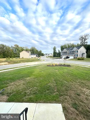 a view of yard with ocean view