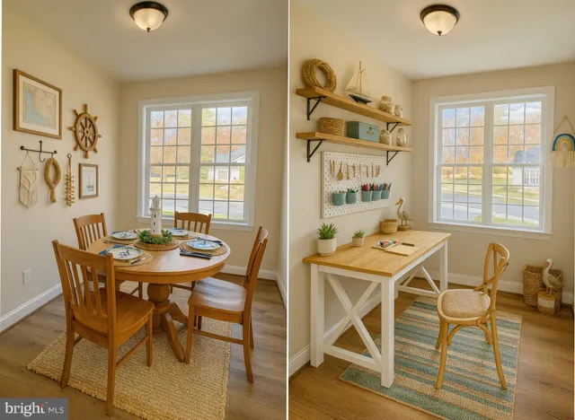 a view of a dining room with furniture and a window