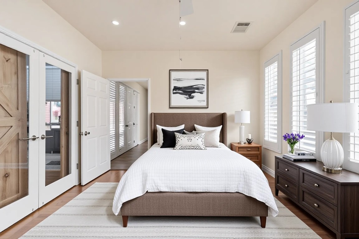 7109 Via Correto Drive Austin, TX 78749 - Photo 14 of 40 a spacious bedroom with a bed and window