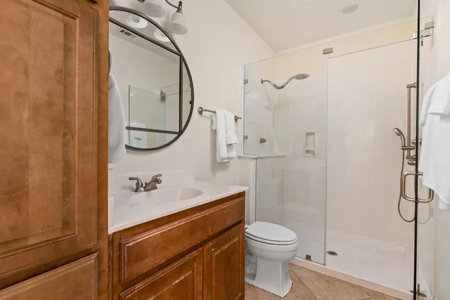 a kitchen with stainless steel appliances granite countertop a stove a sink dishwasher a refrigerator and a microwave